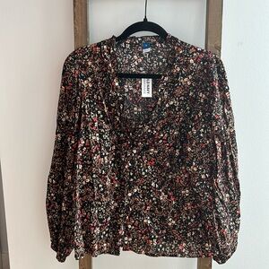 Black floral cotton button up blouse with subtle ruffle collar. Never worn!